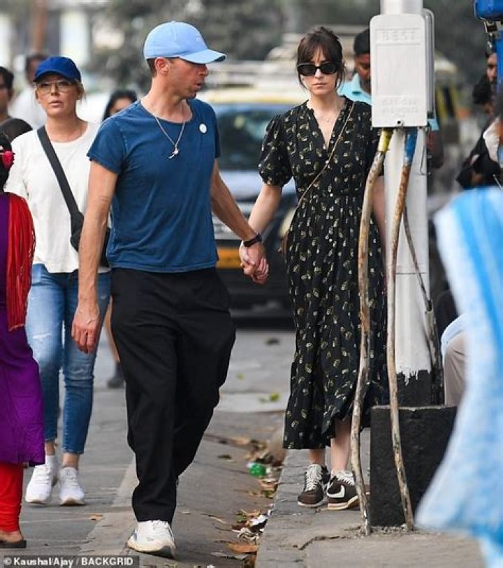 Dakota Johnson's Relationship With Chris Martin